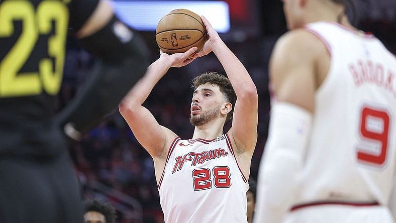 Jan 20, 2024; Houston, Texas, USA; Houston Rockets center Alperen Sengun (28) attempts a free throw during the fourth quarter against the Utah Jazz at Toyota Center. Mandatory Credit: Troy Taormina-USA TODAY Sports