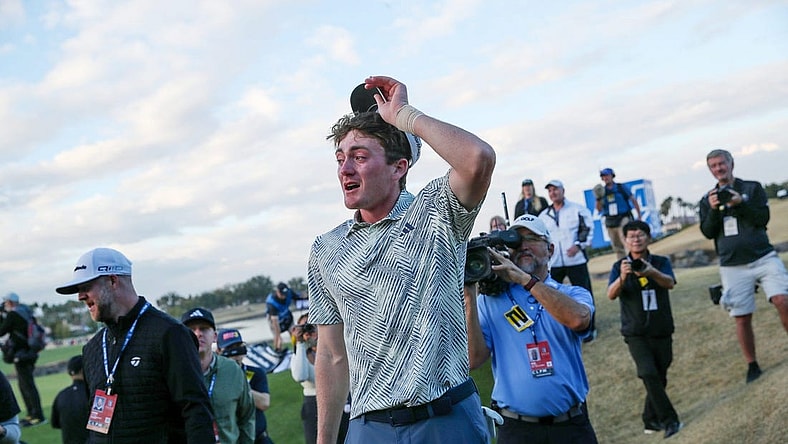 Nick Dunlap reacts after winning The American Express as the first amateur to win the PGA Tour event in 33 years in La Quinta, Calif., on Sunday, January 21, 2024.