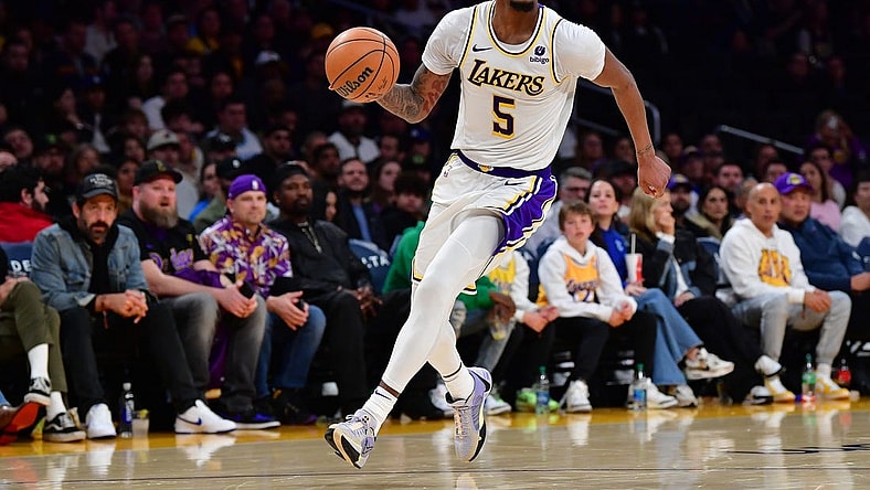 Jan 21, 2024; Los Angeles, California, USA; Los Angeles Lakers forward Cam Reddish (5) moves to the basket against the Portland Trail Blazers during the second half at Crypto.com Arena. Mandatory Credit: Gary A. Vasquez-USA TODAY Sports