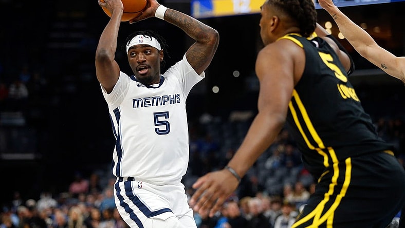 Jan 15, 2024; Memphis, Tennessee, USA; Memphis Grizzlies guard Vince Williams Jr. (5) passes the ball during the first half against the Golden State Warriors at FedExForum. Mandatory Credit: Petre Thomas-USA TODAY Sports