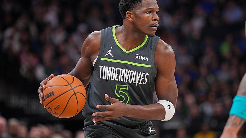 Jan 22, 2024; Minneapolis, Minnesota, USA; Minnesota Timberwolves guard Anthony Edwards (5) dribbles against the Charlotte Hornets in the first quarter at Target Center. Mandatory Credit: Brad Rempel-USA TODAY Sports