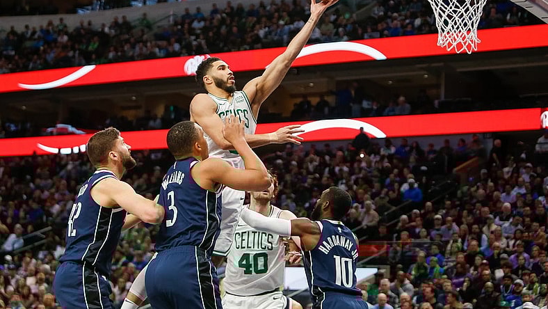 Jan 22, 2024; Dallas, Texas, USA; Boston Celtics forward Jayson Tatum (0) shoots during the first quarter against the Dallas Mavericks at American Airlines Center. Mandatory Credit: Andrew Dieb-USA TODAY Sports