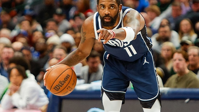 Jan 22, 2024; Dallas, Texas, USA; Dallas Mavericks guard Kyrie Irving (11) points while handling the ball during the fourth quarter against the Boston Celtics at American Airlines Center. Mandatory Credit: Andrew Dieb-USA TODAY Sports