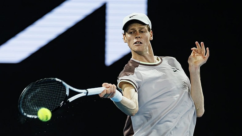 Jan 23, 2024; Melbourne, Victoria, Australia;  Jannik Sinner of Italy in action against Andrey Rublev of Russia in the quarter final of the men s singles. Mandatory Credit: Mike Frey-USA TODAY Sports
