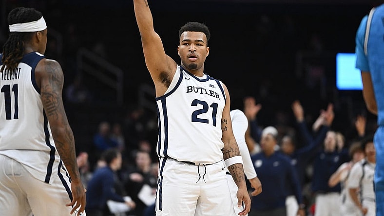 Jan 23, 2024; Washington, District of Columbia, USA; Butler Bulldogs guard Pierre Brooks (21) reacts after a three point basket against the Butler Bulldogs during the first half at Capital One Arena. Mandatory Credit: Brad Mills-USA TODAY Sports