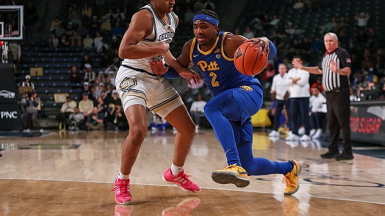 Jan 23, 2024; Atlanta, Georgia, USA; Pittsburgh Panthers forward Blake Hinson (2) is defended by Georgia Tech Yellow Jackets guard Dallan Coleman (3) in the first half at McCamish Pavilion. Mandatory Credit: Brett Davis-USA TODAY Sports