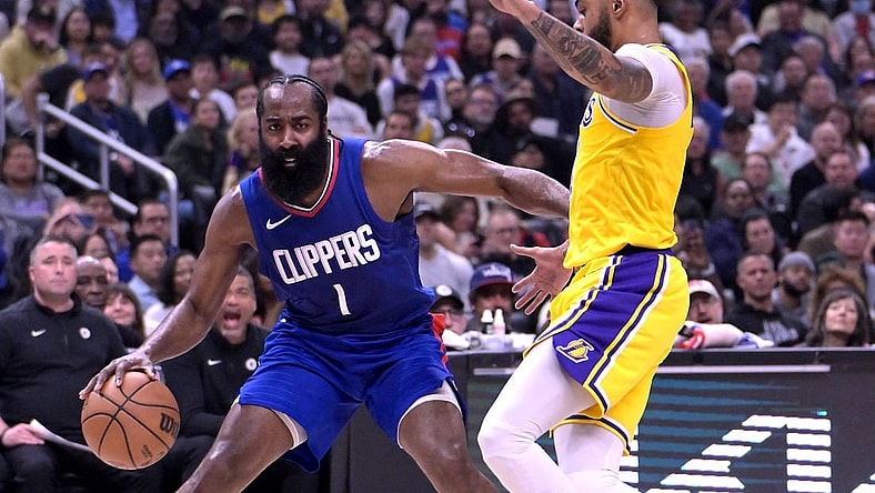 Jan 23, 2024; Los Angeles, California, USA; Los Angeles Clippers guard James Harden (1) is defended by Los Angeles Lakers guard D'Angelo Russell (1) in the first half at Crypto.com Arena. Mandatory Credit: Jayne Kamin-Oncea-USA TODAY Sports