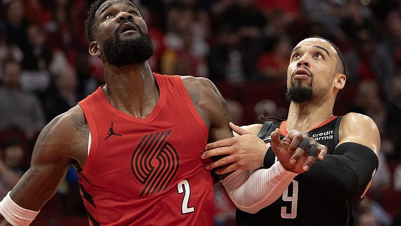 Jan 24, 2024; Houston, Texas, USA; Portland Trail Blazers center Deandre Ayton (2) tries to box out Houston Rockets forward Dillon Brooks (9) in the second quarter at Toyota Center. Mandatory Credit: Thomas Shea-USA TODAY Sports