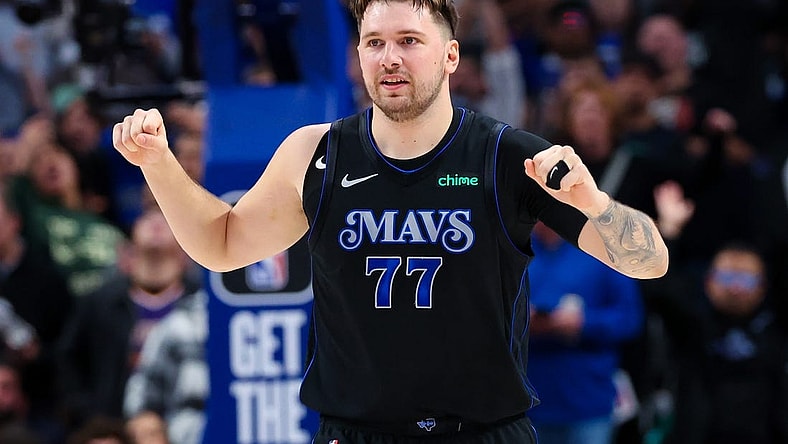 Jan 24, 2024; Dallas, Texas, USA;  Dallas Mavericks guard Luka Doncic (77) reacts during the first half against the Phoenix Suns at American Airlines Center. Mandatory Credit: Kevin Jairaj-USA TODAY Sports