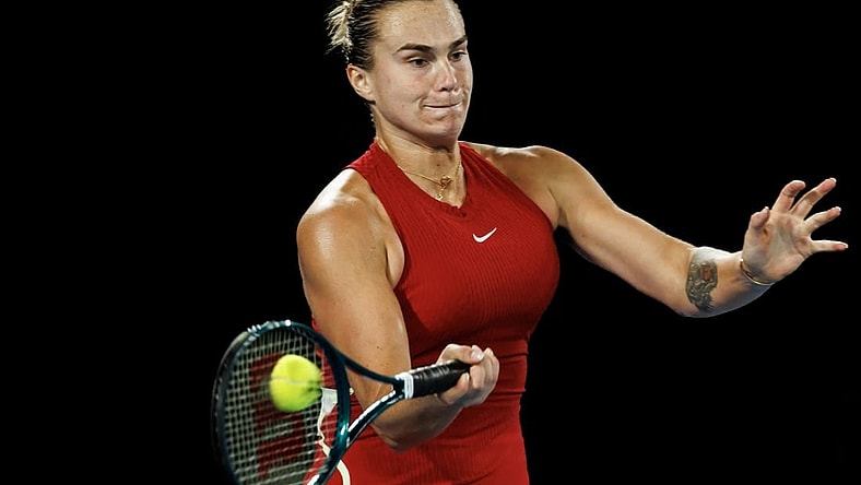 Jan 25, 2024; Melbourne, Victoria, Australia; Aryna Sabalenka of Belarus in action against Coco Gauff of the United States in the semi-final of the women s singles at the Australian Open. Mandatory Credit: Mike Frey-USA TODAY Sports
