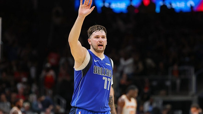 Jan 26, 2024; Atlanta, Georgia, USA; Dallas Mavericks guard Luka Doncic (77) waves to the crowd against the Atlanta Hawks in the fourth quarter at State Farm Arena. Mandatory Credit: Brett Davis-USA TODAY Sports