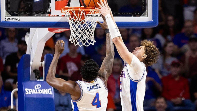 Jan 27, 2024; Gainesville, Florida, USA; Florida Gators center Micah Handlogten (3) dunks the ball against the Georgia Bulldogs during the first half at Exactech Arena at the Stephen C. O'Connell Center. Mandatory Credit: Matt Pendleton-USA TODAY Sports