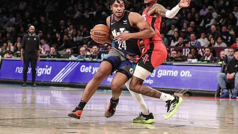 Jan 27, 2024; Brooklyn, New York, USA; Brooklyn Nets guard Cam Thomas (24) drives passed Houston Rockets guard Jalen Green (4) in the second quarter at Barclays Center. Mandatory Credit: Wendell Cruz-USA TODAY Sports