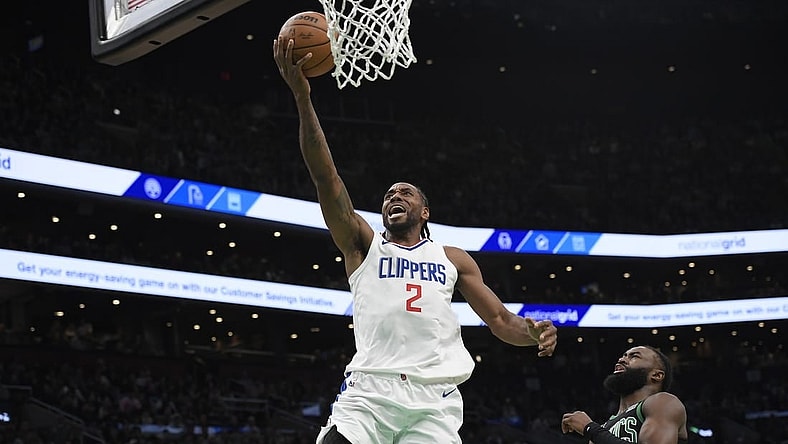 Jan 27, 2024; Boston, Massachusetts, USA;  LA Clippers forward Kawhi Leonard (2) lays the ball in the basket during the first half against the Boston Celtics at TD Garden. Mandatory Credit: Bob DeChiara-USA TODAY Sports