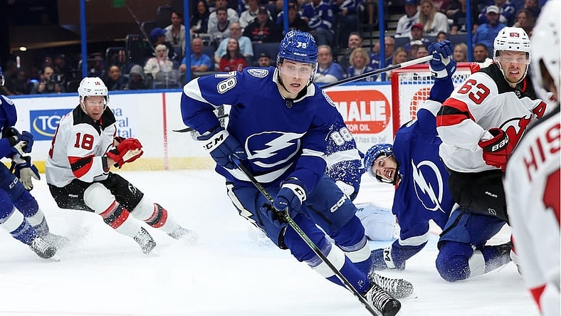 Jan 27, 2024; Tampa, Florida, USA; Tampa Bay Lightning defenseman Emil Martinsen Lilleberg (78) skates with the puck against the New Jersey Devils during the second period at Amalie Arena. Mandatory Credit: Kim Klement Neitzel-USA TODAY Sports