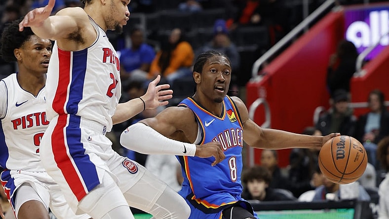 Jan 28, 2024; Detroit, Michigan, USA; Oklahoma City Thunder forward Jalen Williams (8) dribbles on Detroit Pistons forward Kevin Knox II (24) in the first half at Little Caesars Arena. Mandatory Credit: Rick Osentoski-USA TODAY Sports