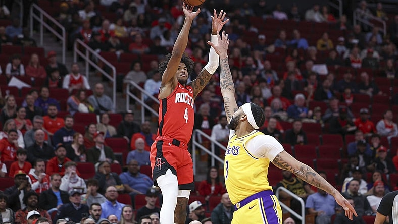 Jan 29, 2024; Houston, Texas, USA; Houston Rockets guard Jalen Green (4) shoots the ball as Los Angeles Lakers forward Anthony Davis (3) defends during the first quarter at Toyota Center. Mandatory Credit: Troy Taormina-USA TODAY Sports