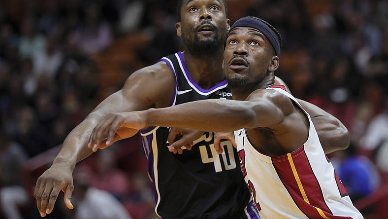 Jan 31, 2024; Miami, Florida, USA; Miami Heat forward Jimmy Butler (22) guards Sacramento Kings forward Harrison Barnes (40) during a free throw attempts in the first quarter at Kaseya Center. Mandatory Credit: Sam Navarro-USA TODAY Sports