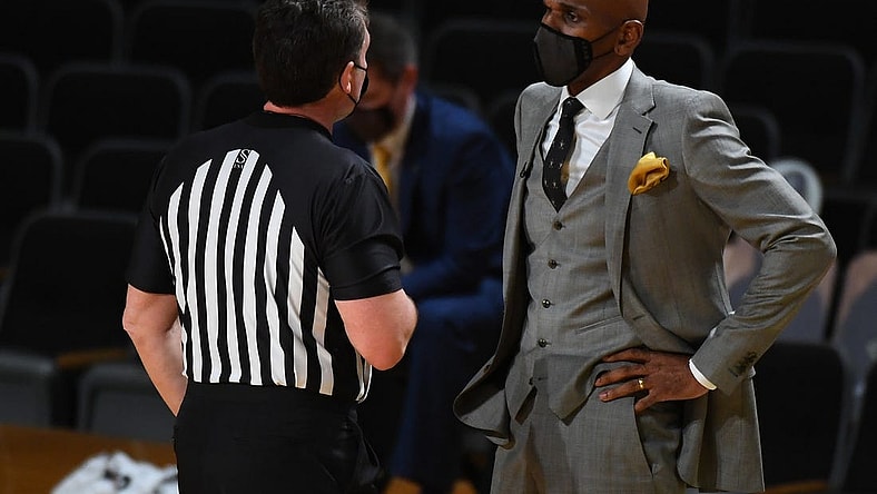 Feb 17, 2021; Nashville, Tennessee, USA; Vanderbilt Commodores head coach Jerry Stackhouse questions an official on a call during the second half against the Kentucky Wildcats at Memorial Gymnasium. Mandatory Credit: Christopher Hanewinckel-USA TODAY Sports