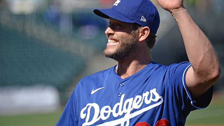 Los Angeles Dodgers starting pitcher Clayton Kershaw (22) waves to fans. Mandatory Credit: Joe Camporeale-USA TODAY Sports