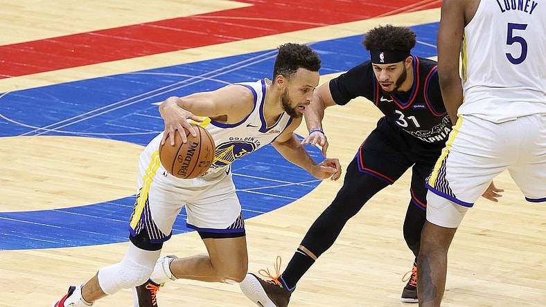 Apr 19, 2021; Philadelphia, Pennsylvania, USA; Golden State Warriors guard Stephen Curry (30) drives past Philadelphia 76ers guard Seth Curry (31) during the second quarter at Wells Fargo Center. Mandatory Credit: Bill Streicher-USA TODAY Sports
