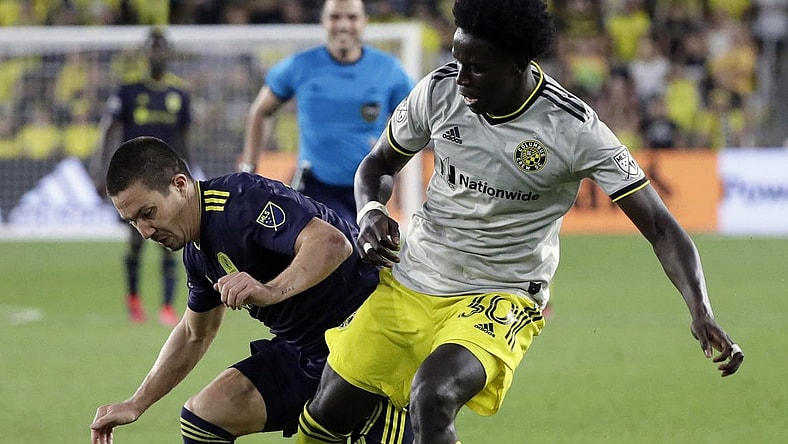 Defender Aboubacar Keita, right.