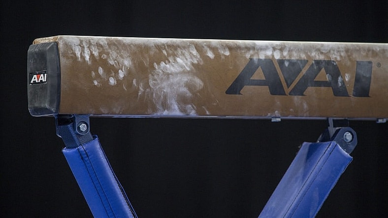 Apr 16, 2022; Fort Worth, TX, USA; A view of balance beam and powder marks during the warmups before the finals of the 2022 NCAA women's gymnastics championship at Dickies Arena. Mandatory Credit: Jerome Miron-USA TODAY Sports