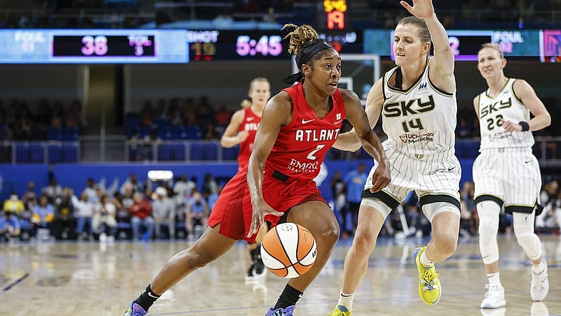 Jun 17, 2022; Chicago, Illinois, USA; Atlanta Dream guard Aari McDonald (2) drives to the basket against Chicago Sky guard Allie Quigley (14) during the first half of a WNBA game at Wintrust Arena. Mandatory Credit: Kamil Krzaczynski-USA TODAY Sports