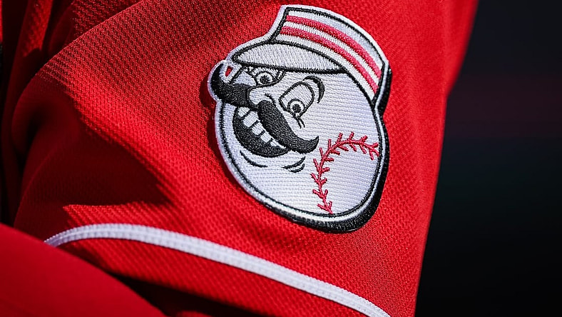 Aug 28, 2022; Washington, District of Columbia, USA; A detailed view of the Cincinnati Reds jersey logo during the ninth inning of the game between the Washington Nationals and the Cincinnati Reds at Nationals Park. Mandatory Credit: Scott Taetsch-USA TODAY Sports