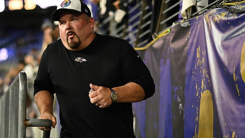 Oct 9, 2022; Baltimore, Maryland, USA;  Baltimore Ravens offensive coordinator Greg Roman runs on the field  before the game against the Cincinnati Bengals at M&T Bank Stadium. Mandatory Credit: Tommy Gilligan-USA TODAY Sports