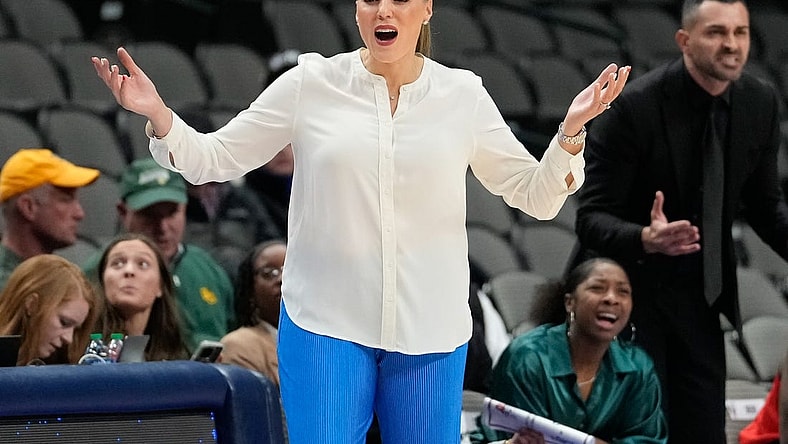 Dec 18, 2022; Dallas, Texas, USA; Arizona Wildcats head coach Adia Barnes reacts to a call against the Baylor Lady Bears during the first half at American Airlines Center. Mandatory Credit: Chris Jones-USA TODAY Sports