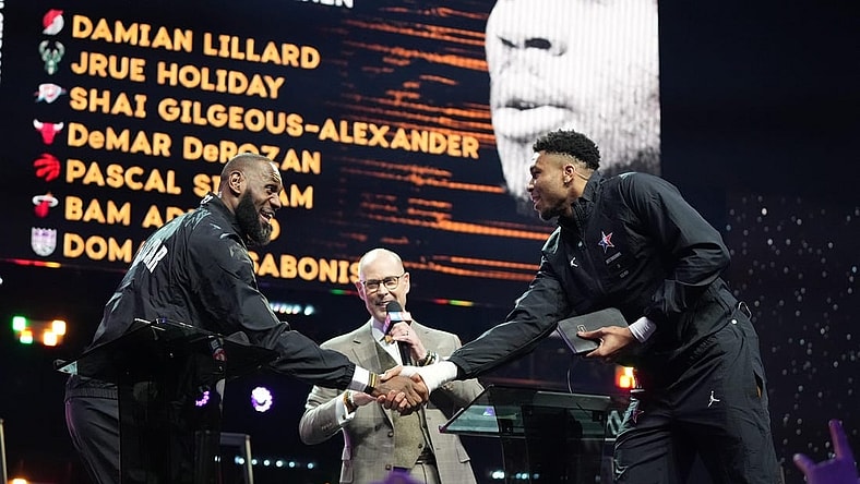 Feb 19, 2023; Salt Lake City, UT, USA; Team LeBron forward LeBron James (left) shakes hands with Team Giannis forward Giannis Antetokounmpo (right) after completing the draft before the 2023 NBA All-Star Game at Vivint Arena. Mandatory Credit: Kyle Terada-USA TODAY Sports