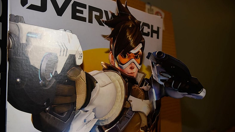 A cutout from the game Overwatch stands up at Next Generation Gaming in Grovetown, Ga., on Thursday, March 23, 2023. Next Generation Gaming will host both old arcade games and modern consoles, such as the Nintendo Switch and Playstations.

News Next Generation Gaming