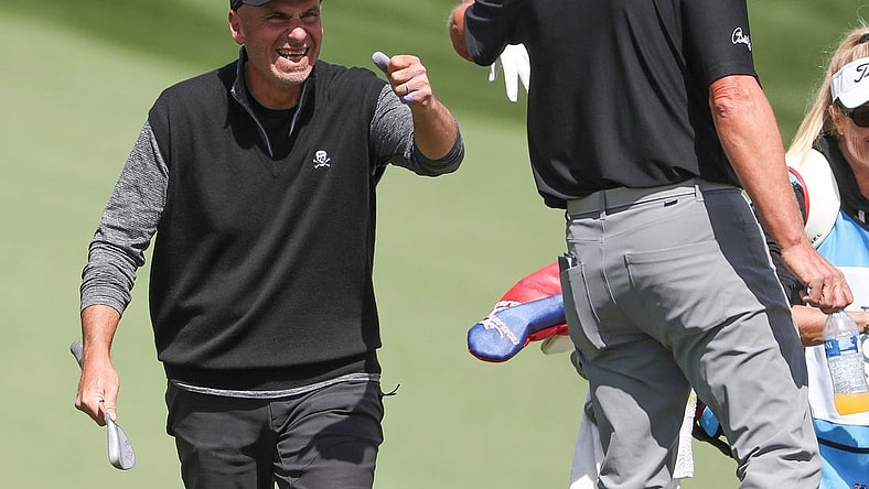 Rocco Mediate fist bumps Steve Stricker after Mediate chipped in for an eagle on the 11th hole during the Galleri Classic at Mission Hills Country Club in Rancho Mirage, March 26, 2023.

Galleri Classic Sunday 8