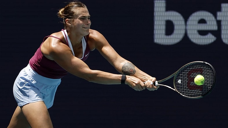 Mar 29, 2023; Miami, Florida, US; Aryna Sabalenka hits a backhand against Sorana Cirstea (ROU) (not pictured) in a women's singles quarterfinal on day ten of the Miami Open at Hard Rock Stadium. Mandatory Credit: Geoff Burke-USA TODAY Sports