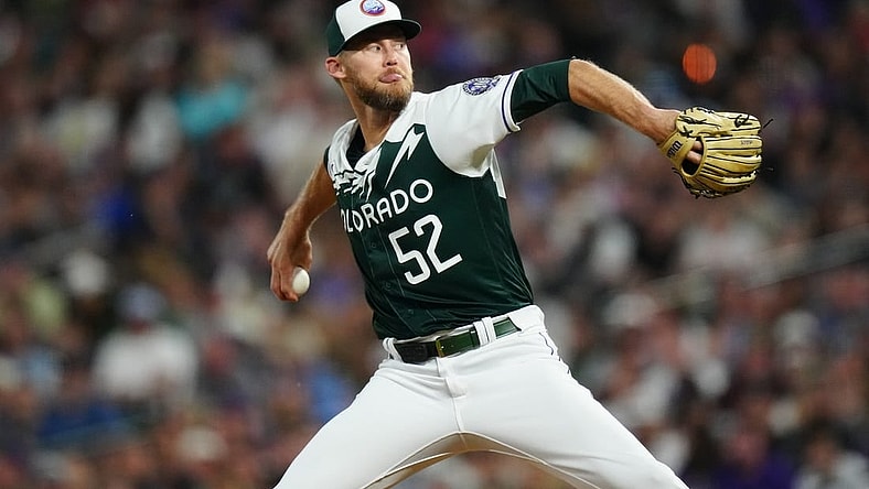 Jul 1, 2023; Denver, Colorado, USA; Colorado Rockies relief pitcher Daniel Bard (52) delivers a pitch in the ninth inning against the Detroit Tigers at Coors Field. Mandatory Credit: Ron Chenoy-USA TODAY Sports