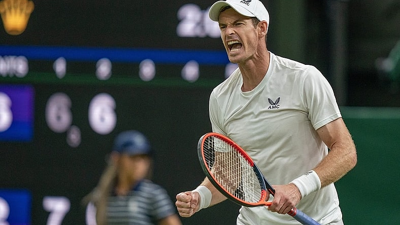 Jul 6, 2023; London, United Kingdom; Andy Murray (GBR) reacts to a point during his match against Stefanos Tsitsipas (GRE) on day four at the All England Lawn Tennis and Croquet Club.  Mandatory Credit: Susan Mullane-USA TODAY Sports