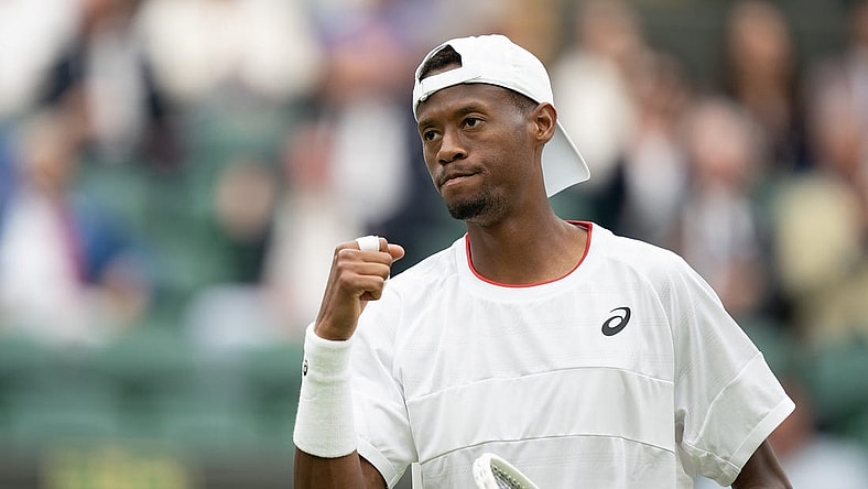 Jul 12, 2023; London, United Kingdom; Christopher Eubanks (USA) reacts to a point during his match against Daniil Medvedev on day ten of Wimbledon at the All England Lawn Tennis and Croquet Club.  Mandatory Credit: Susan Mullane-USA TODAY Sports