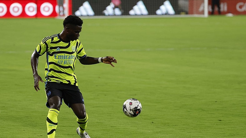 Jul 19, 2023; Washington, DC, USA; Arsenal midfielder Bukayo Saka (7) dribbles the ball against MLS All-Stars in the 2023 MLS All Star Game at Audi Field. Mandatory Credit: Geoff Burke-USA TODAY Sports