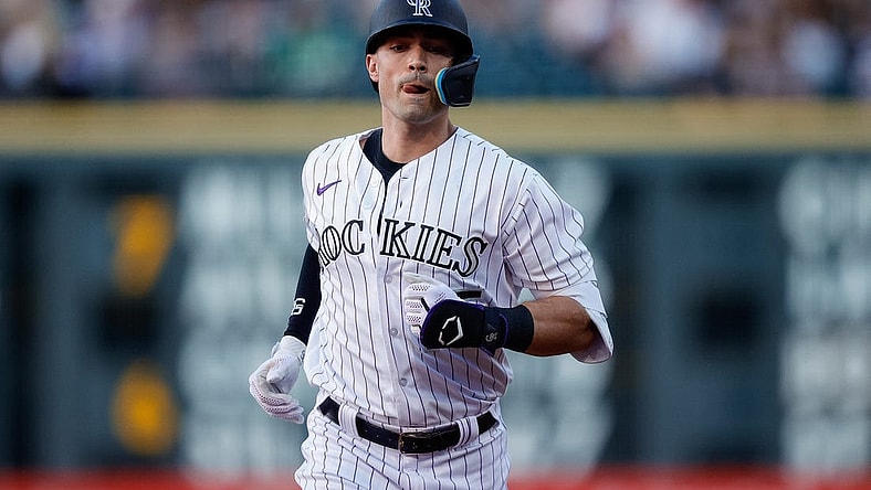 Jul 28, 2023; Denver, Colorado, USA; Colorado Rockies right fielder Randal Grichuk (15) rounds the bases on a solo home run in the fourth inning against the Oakland Athletics at Coors Field. Mandatory Credit: Isaiah J. Downing-USA TODAY Sports