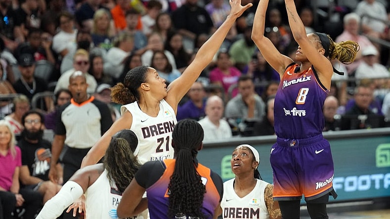 Aug 3, 2023; Phoenix, Arizona, USA; Atlanta Dream center Iliana Rupert (21) defends against Phoenix Mercury guard Moriah Jefferson (8) during the game at at Footprint Center. Mandatory Credit: Joe Camporeale-USA TODAY Sports