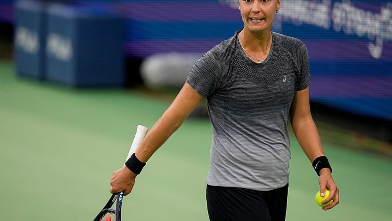 Anhelina Kalinina exchanges words with her coach in the third set of the Round of 32 match between Ons Jaebeur (TUN) and Anhelina Kalinina (Ukraine) in the Western & Southern Open at the Lindner Family Tennis Center in Mason, Ohio, on Tuesday, Aug. 15, 2023. Jaebeur won the match, 6-3, 6-7, 7-6.