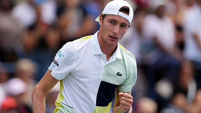 Aug 29, 2023; Flushing, NY, USA; Ugo Humbert of France wins a game in the first set against Matteo Berrettini of Italy on day two of the 2023 U.S. Open tennis tournament at USTA Billie Jean King National Tennis Center. Mandatory Credit: Danielle Parhizkaran-USA TODAY Sports