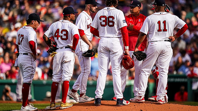 Aug 30, 2023; Boston, Massachusetts, USA; Boston Red Sox manager Alex Cora (13) brings in relief pitcher Joe Jacques (78) as they take on the Houston Astros in the third inning at Fenway Park. Mandatory Credit: David Butler II-USA TODAY Sports
