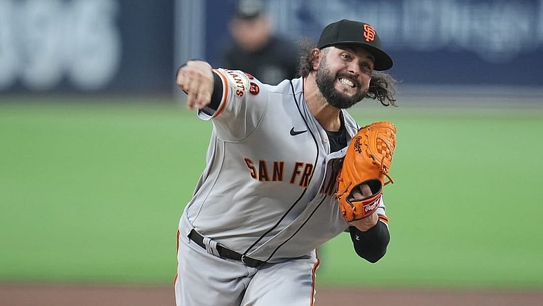 Aug 31, 2023; San Diego, California, USA;  San Francisco Giants starting pitcher Jakob Junis (34) throws a pitch against the San Diego Padres during the first inning at Petco Park. Mandatory Credit: Ray Acevedo-USA TODAY Sports