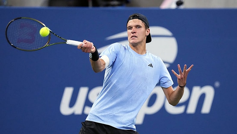 Sep 1, 2023; Flushing, NY, USA; Jakub Mensik of the Czech Republic hits to Taylor Fritz of the United States on day five of the 2023 U.S. Open tennis tournament at USTA Billie Jean King National Tennis Center. Mandatory Credit: Danielle Parhizkaran-USA TODAY Sports