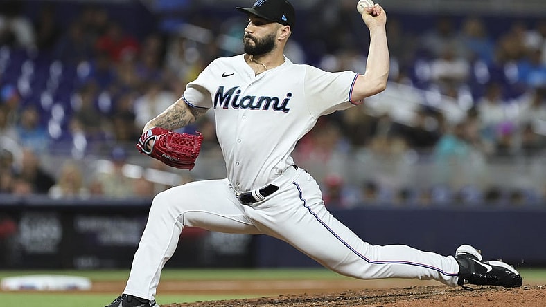 Sep 5, 2023; Miami, Florida, USA; Miami Marlins relief pitcher Tanner Scott (66) delivers a pitch against the Los Angeles Dodgers during the ninth inning at loanDepot Park. Mandatory Credit: Sam Navarro-USA TODAY Sports
