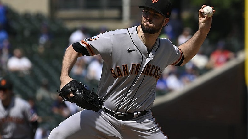 Sep 6, 2023; Chicago, Illinois, USA;  San Francisco Giants starting pitcher Alex Wood (57) delivers a pitch against the Chicago Cubs during the first inning at Wrigley Field. Mandatory Credit: Matt Marton-USA TODAY Sports