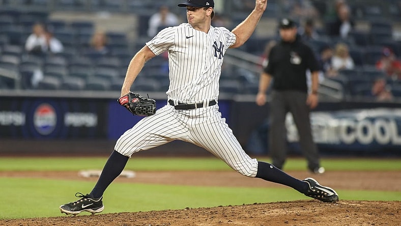 Sep 9, 2023; Bronx, New York, USA;  New York Yankees relief pitcher Matt Krook (92) pitches in the ninth inning against the Milwaukee Brewers at Yankee Stadium. Mandatory Credit: Wendell Cruz-USA TODAY Sports