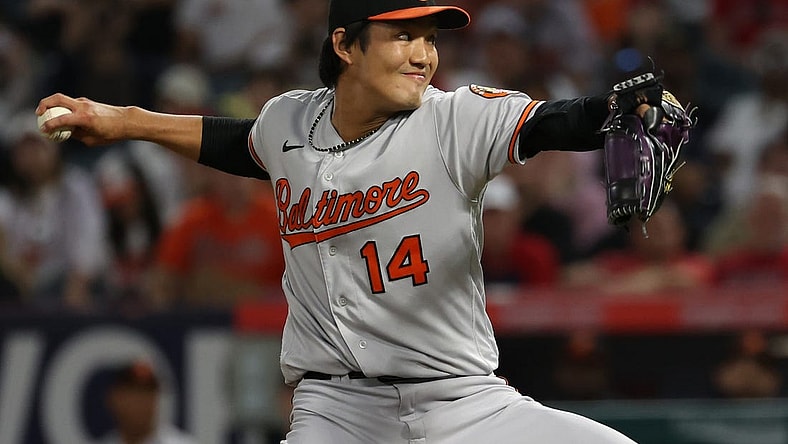 Sep 6, 2023; Anaheim, California, USA;  Baltimore Orioles relief pitcher Shintaro Fujinami (14) pitches during the eighth inning against the Los Angeles Angels at Angel Stadium. Mandatory Credit: Kiyoshi Mio-USA TODAY Sports